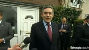 Gordon Brown smiles outside Gillian Duffy's Rochdale house after bigotgate